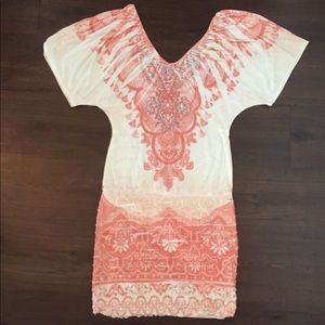Creamy orange and peach party mini dress.